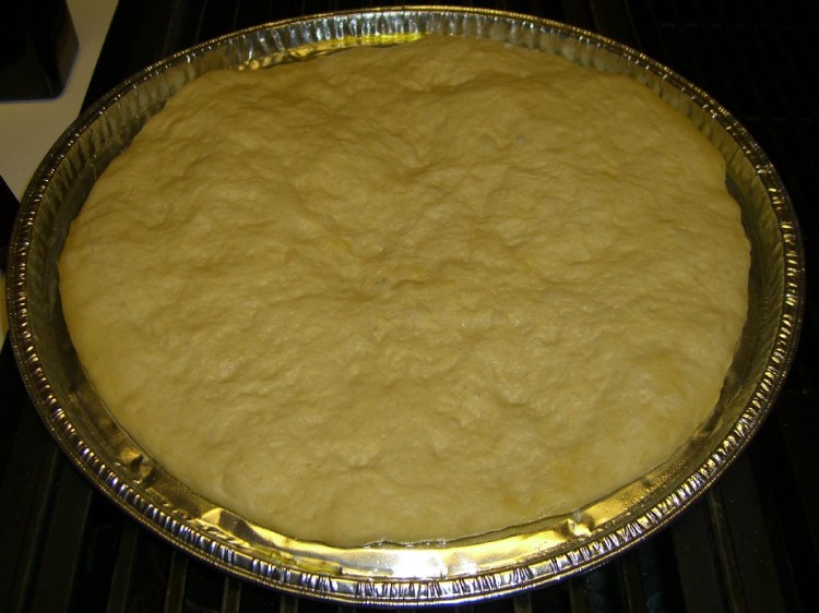 Crust spread out on baking sheet