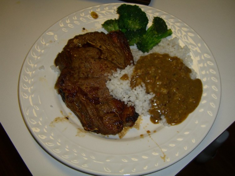 Southern steak, grits and pea gravy