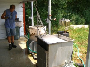 Scalder (front) and de-feathering spinner (back)
