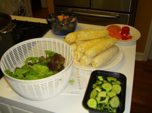 Lettuce, melon, blueberries, tomatoes, sweet corn, cucumbers...mmmm